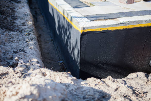 Professional Basement Waterproofing technician working in Bellevue, IL